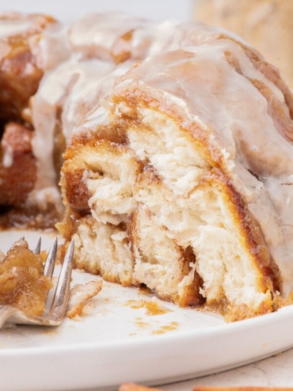 close up of monkey bread with piece cut off the side