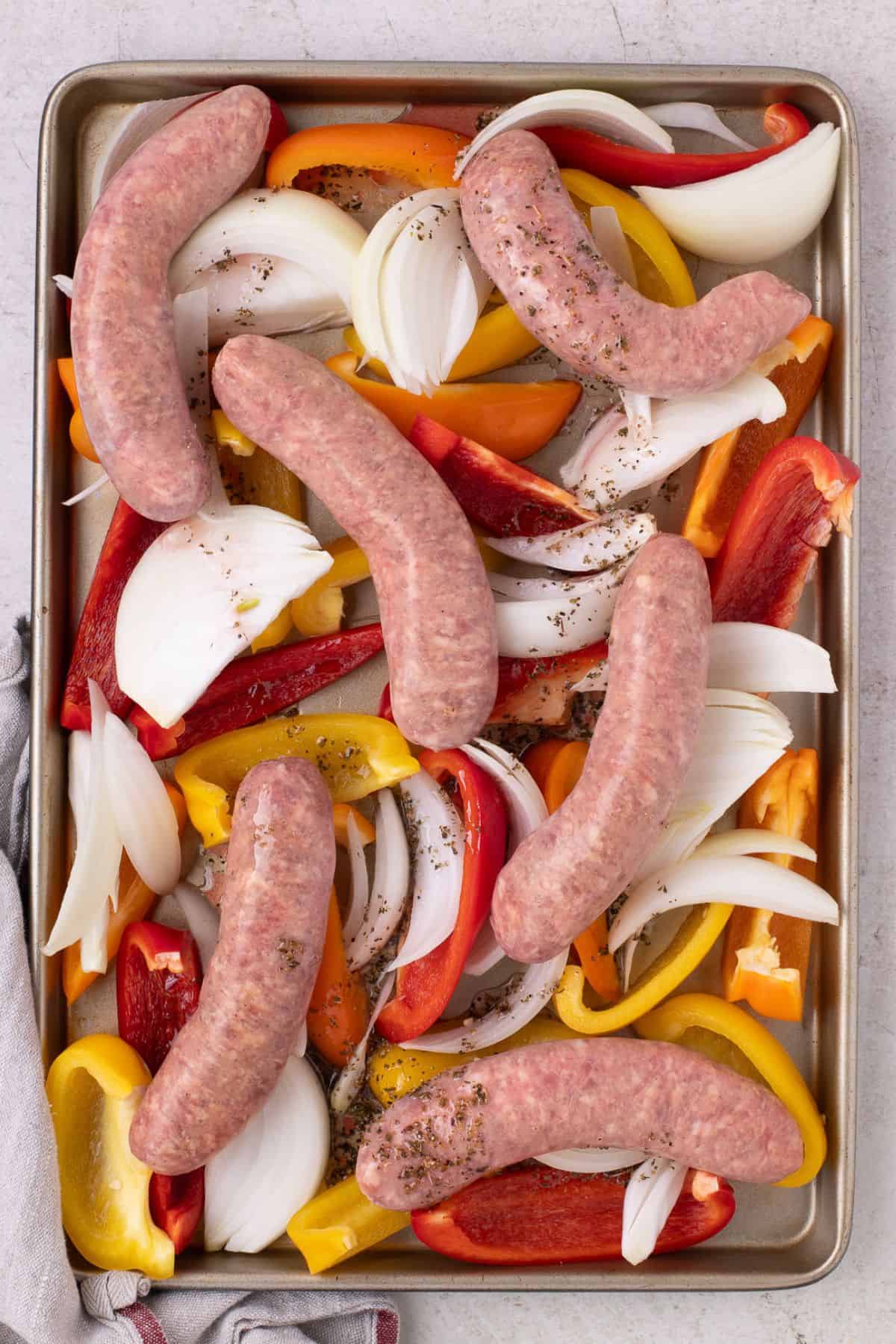 The rest of the ingredients added onto the baking sheet to make italian sausage for more flavor.