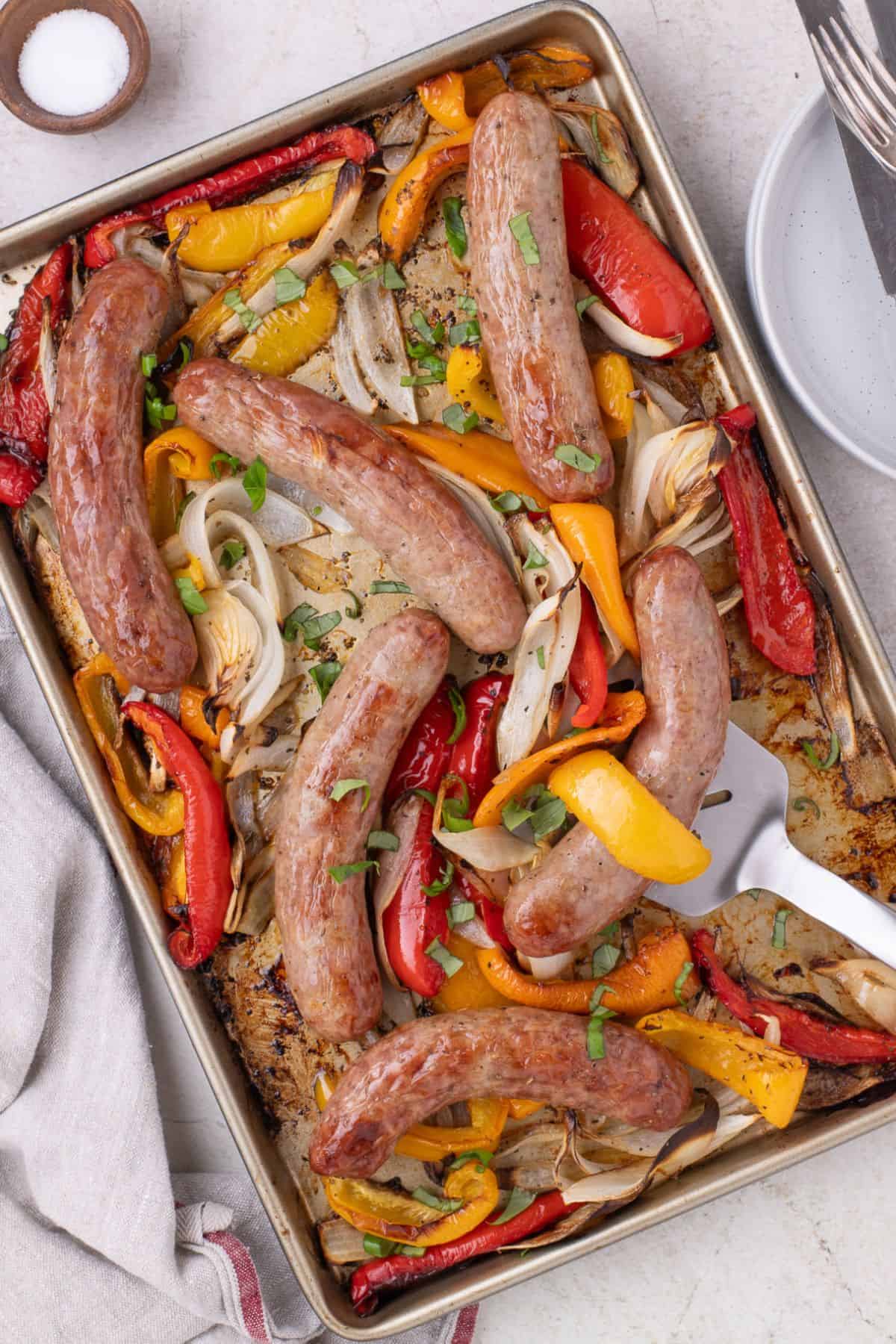 View of the baked italian sausage cooked and removed from the oven.