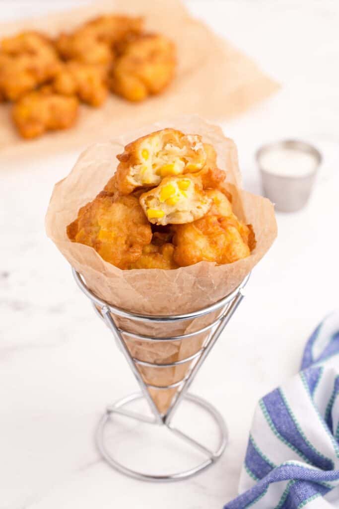 Fry stand filled with corn nuggets.