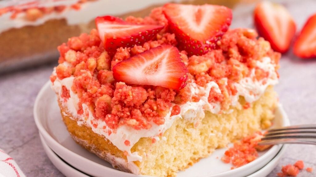 Strawberry shortcake crumble on a white plate.