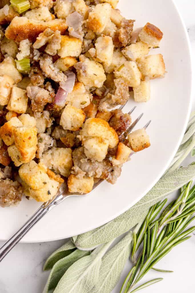Completed stuffing on a white dinner plate.