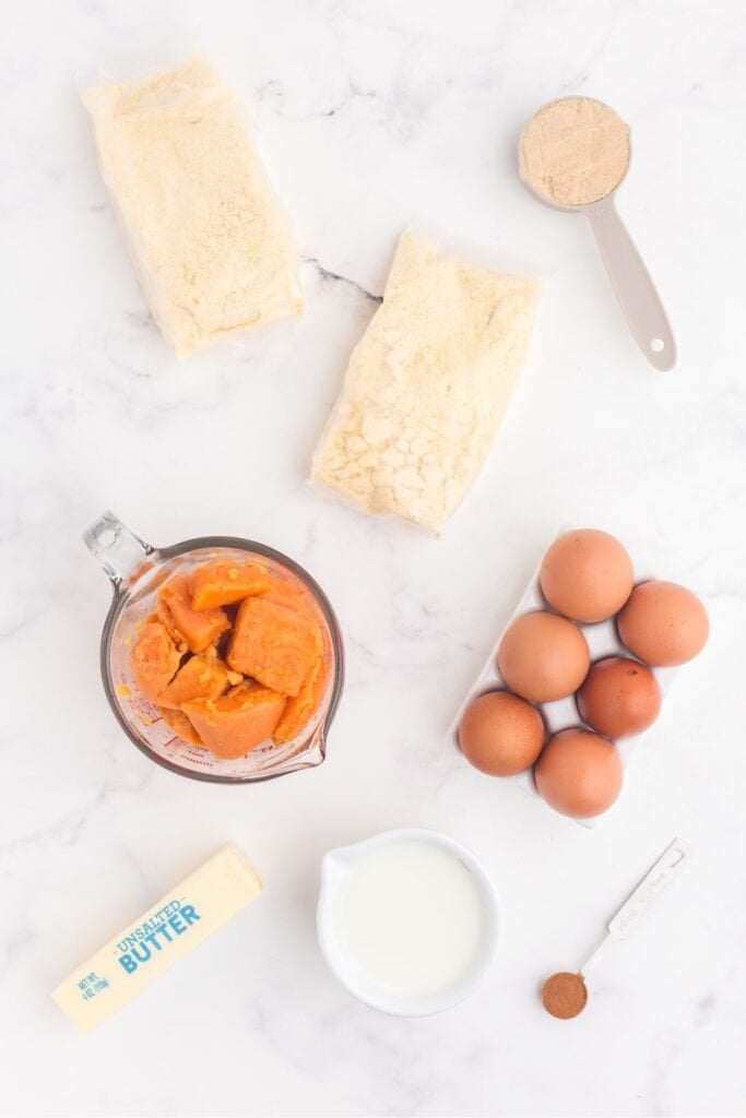 Ingredients for Sweet Potato Cornbread: canned Yams, eggs, milk, brown sugar, cinnamon, melted butter, and Jiffy Cornbread Mix.