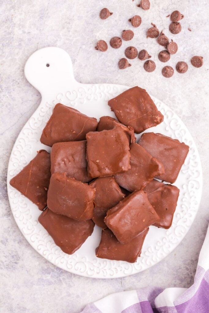 Completed Cool Whip candy piled up on a white serving platter.