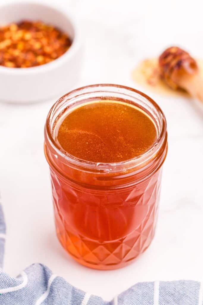 Completed hot honey in a small mason jar.