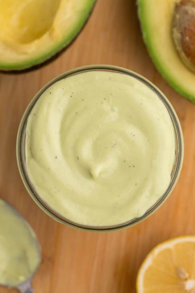 Jar of completed avocado mayo.