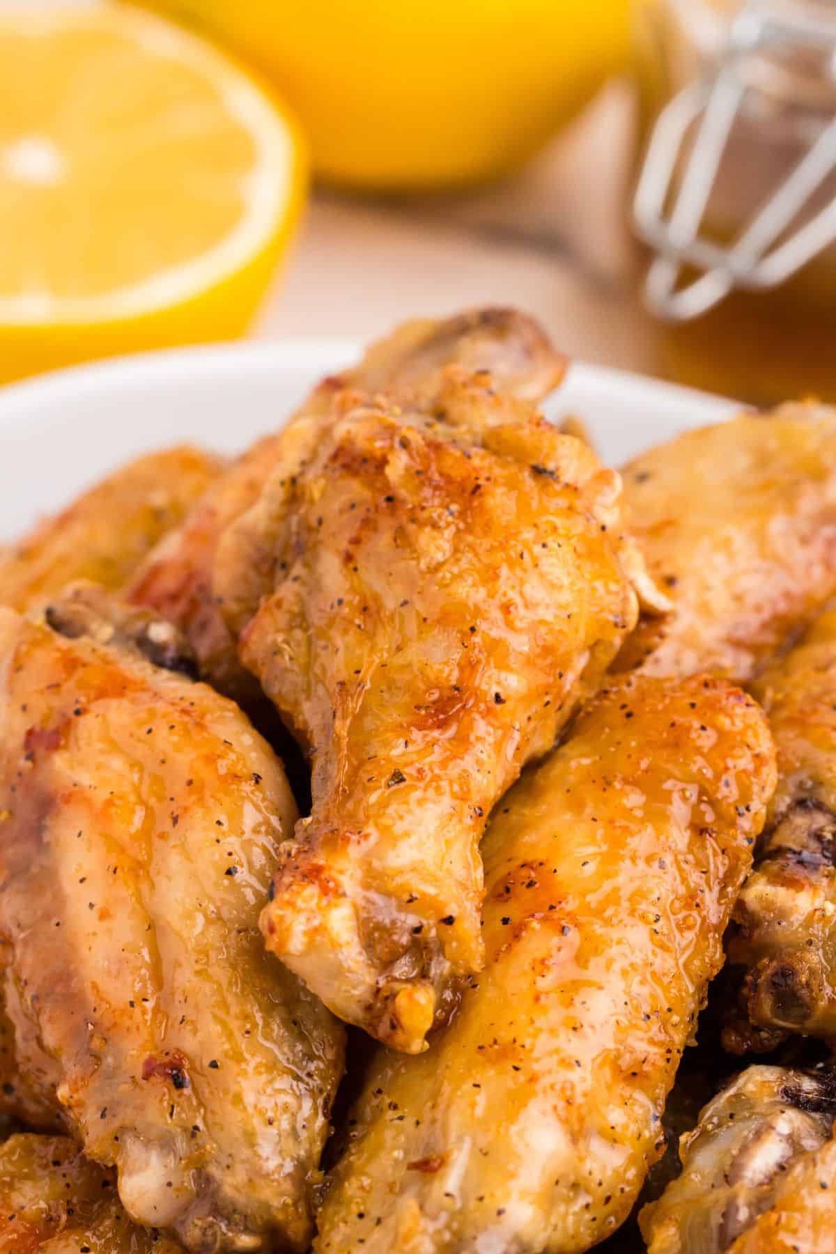 Chicken wings tossed in lemon pepper sauce.