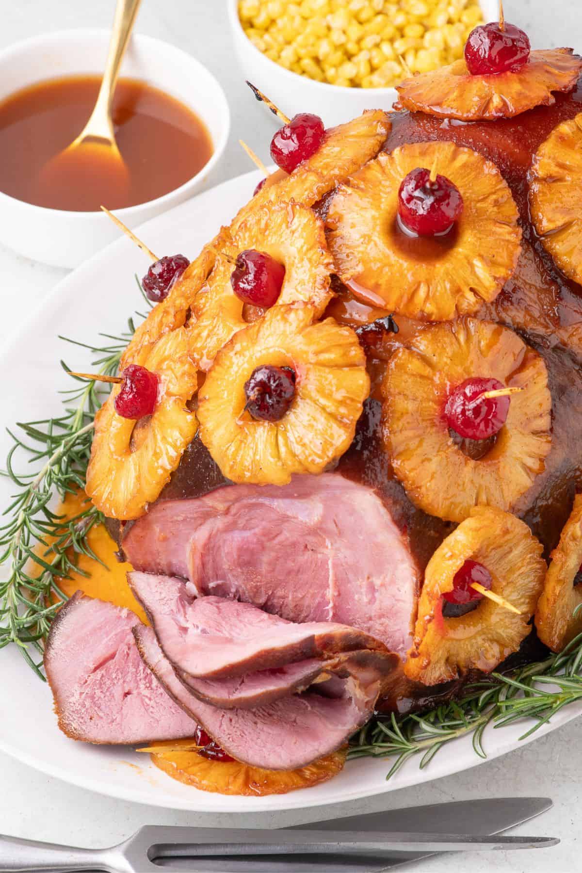 Completed and sliced pineapple glazed ham.