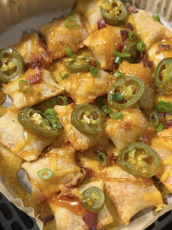 air fryer loaded pizza bites in an air fryer basket.