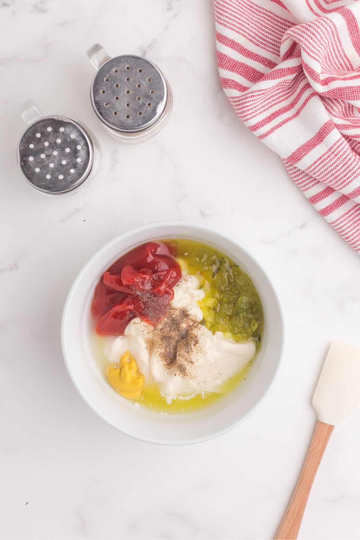 All ingredients are combined in a small, white bowl.