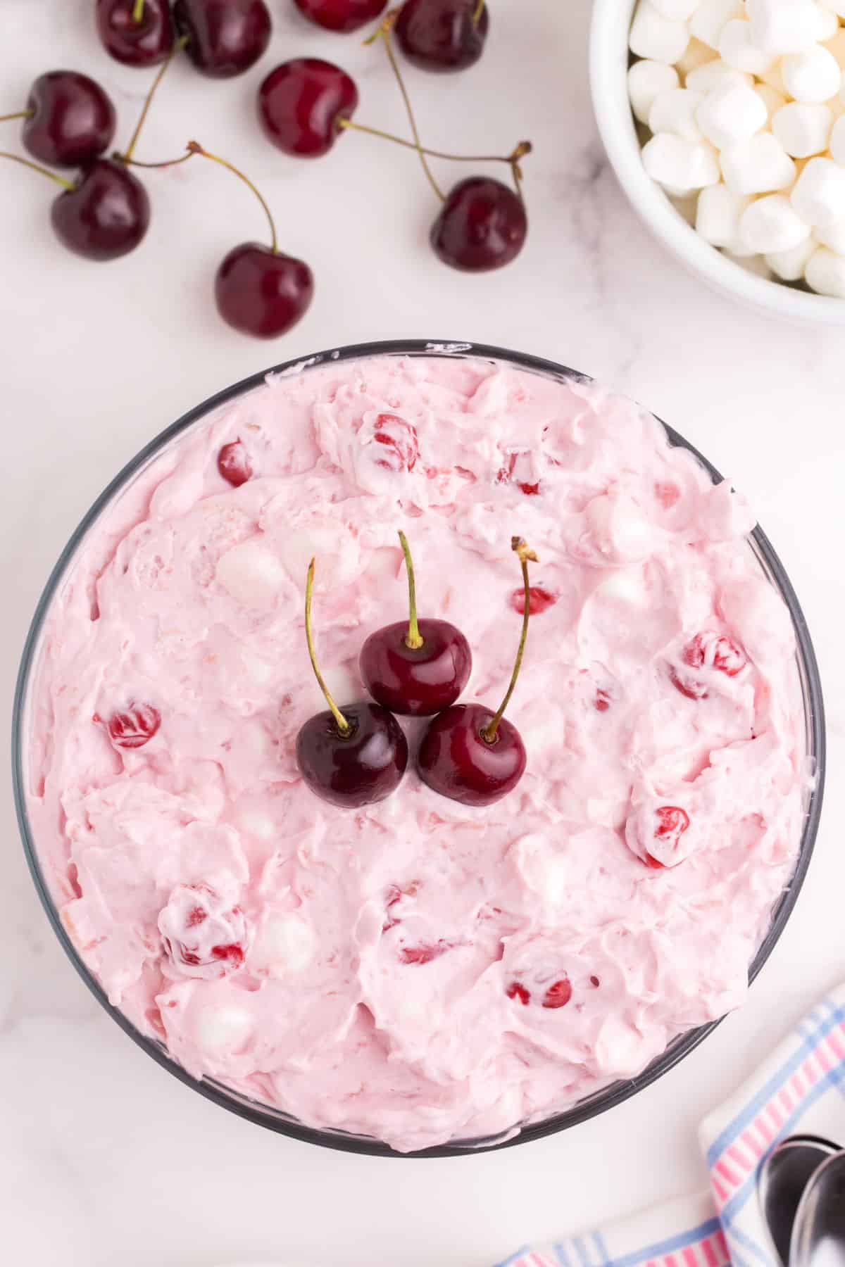 Cherry fluff in a glass serving bowl.