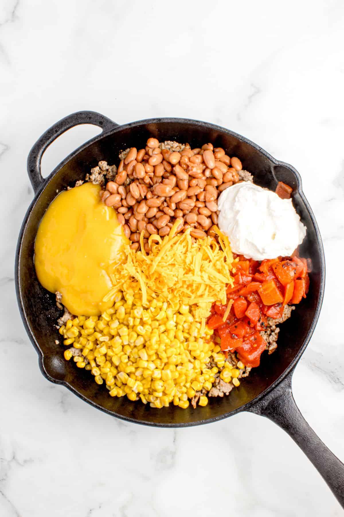 Ingredients for filling combined in cast iron pan.