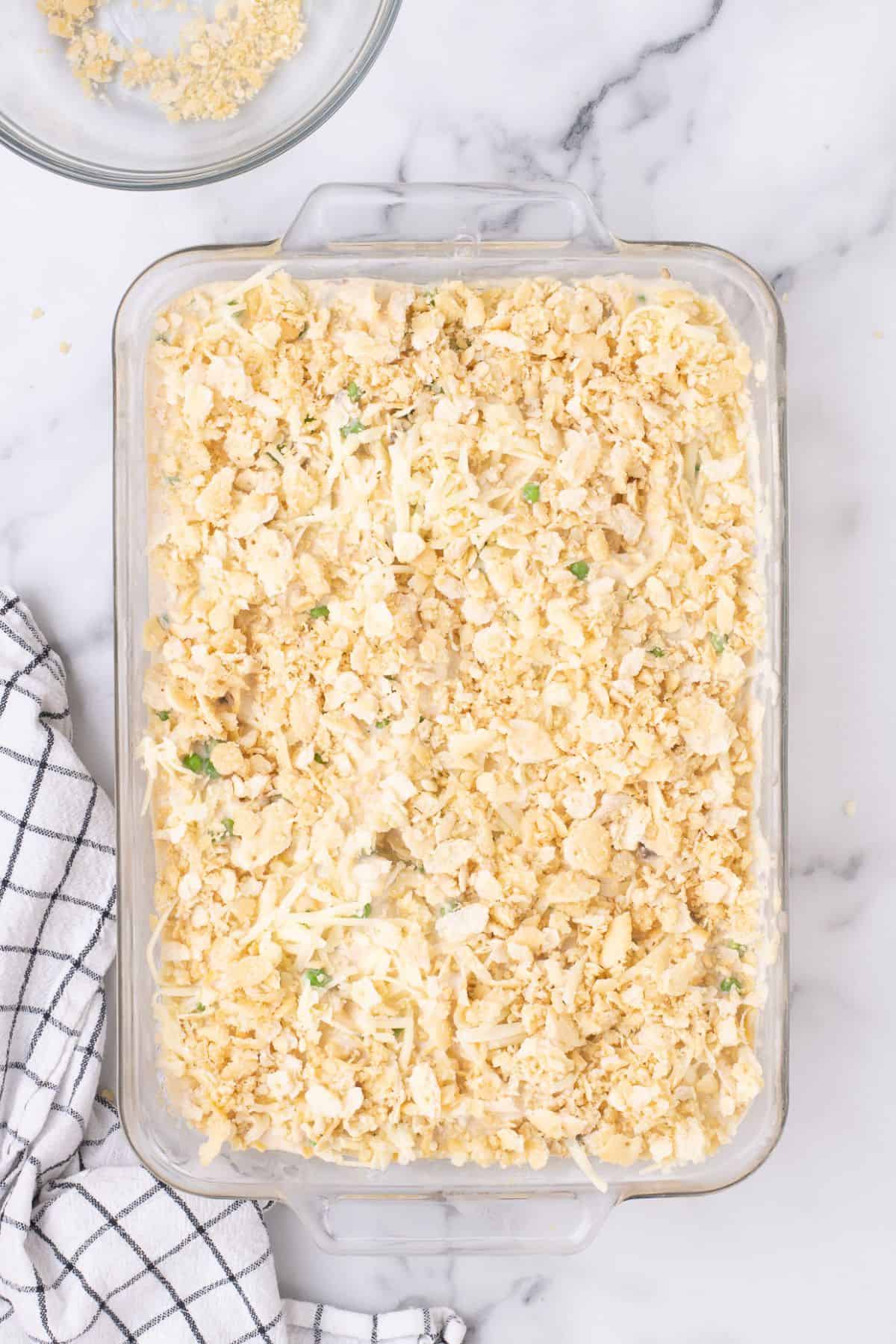 Ritz cracker topping and shredded cheese added to the casserole.