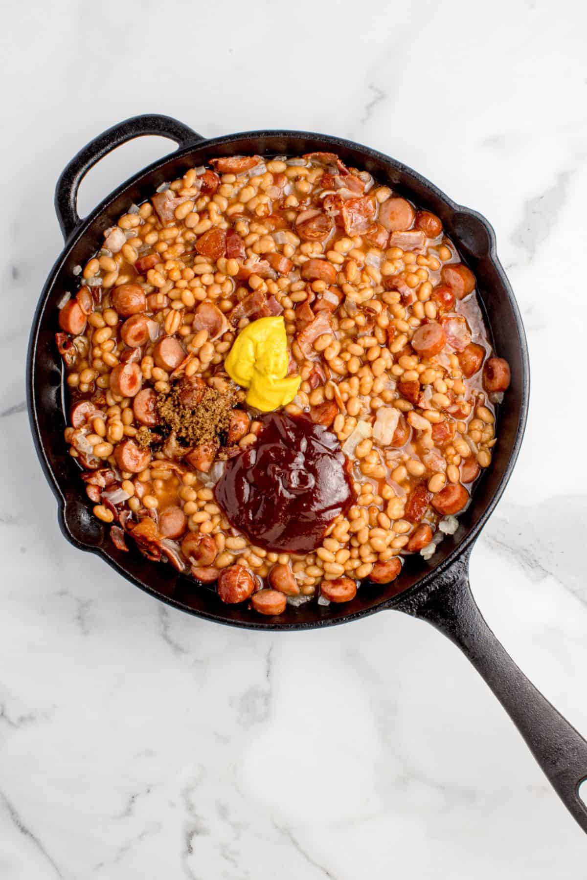 BBQ sauce, brown sugar, and mustard are added to the recipe.