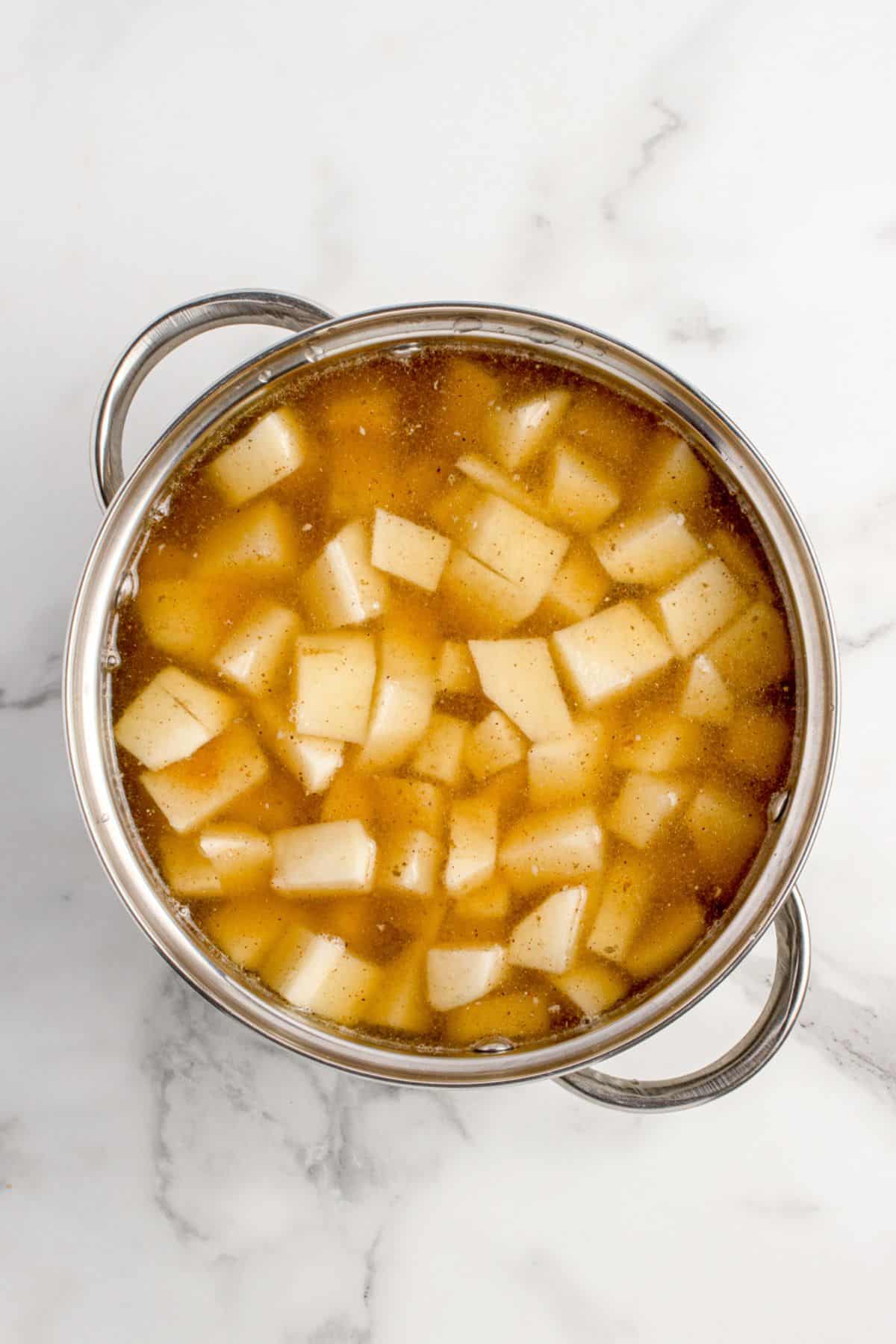 Potatoes cooked in chicken stock.