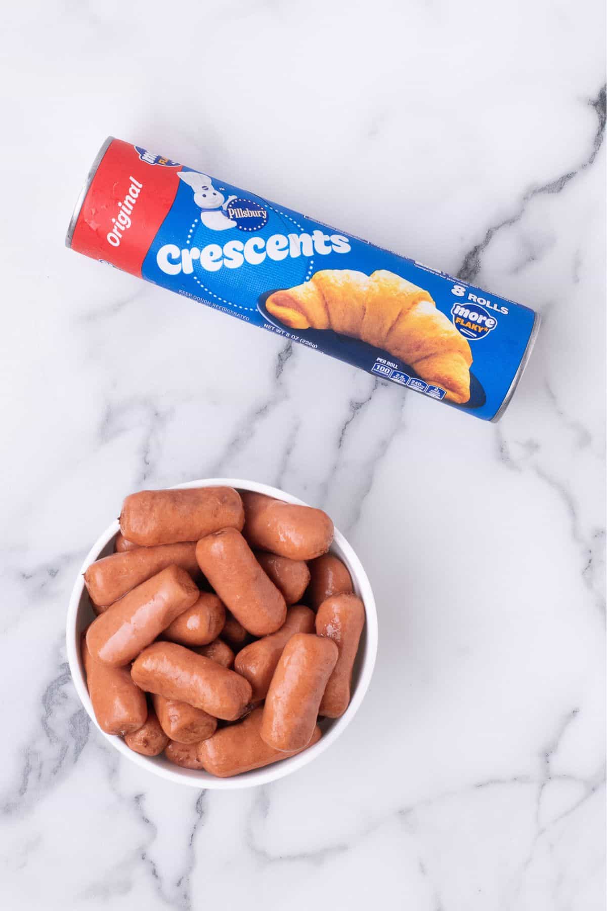 Ingredients for pigs in a blanket with crescent rolls: Lit'l Smokies hot dogs and refrigerated crescent rolls.