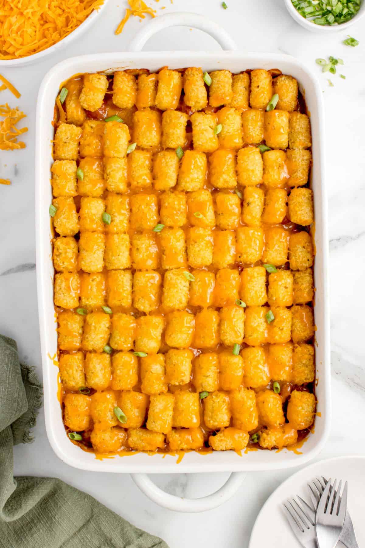Baked hot dog casserole right out of the oven with the cheese melted on top.