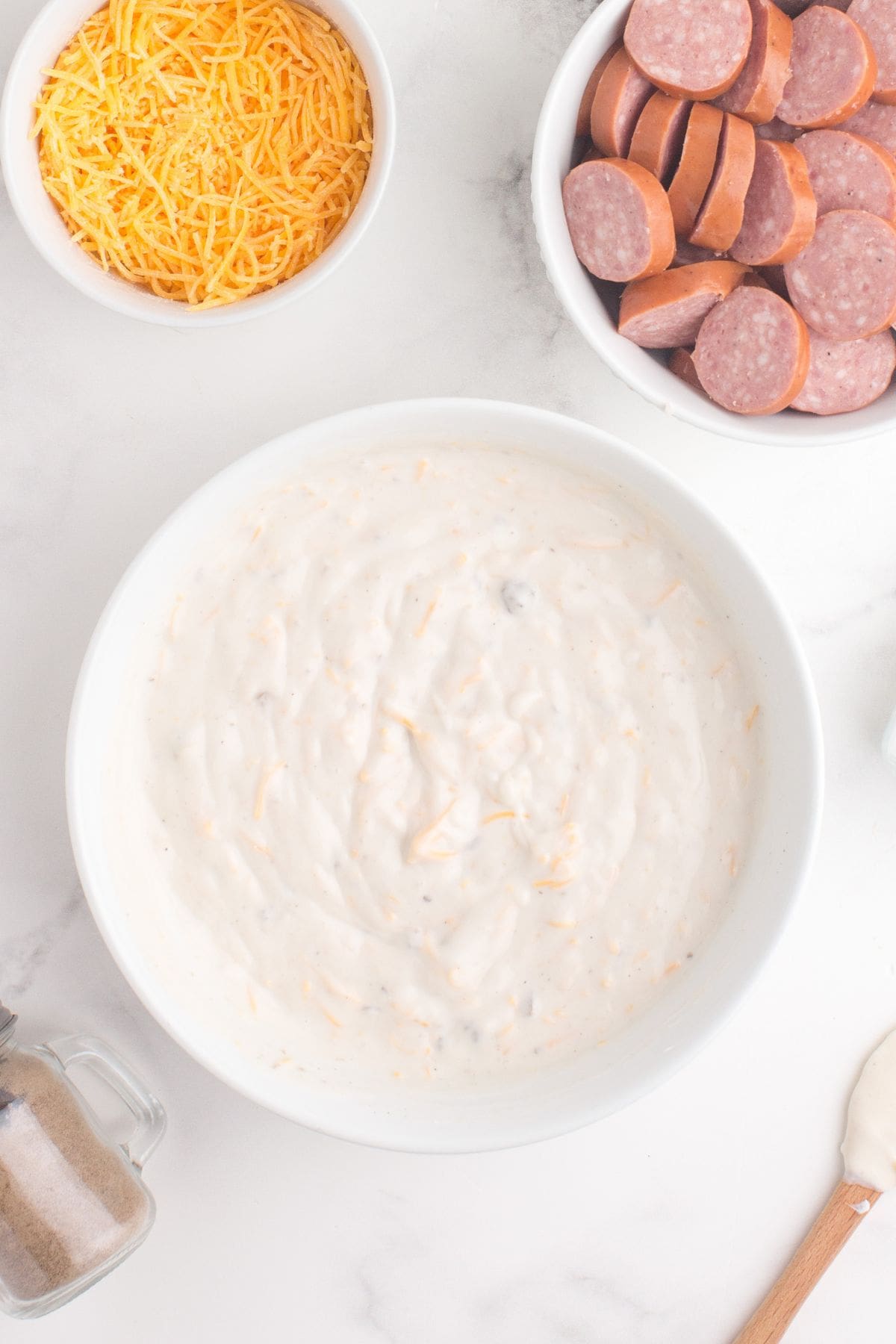 Pierogi casserole sauce mixed in a bowl.