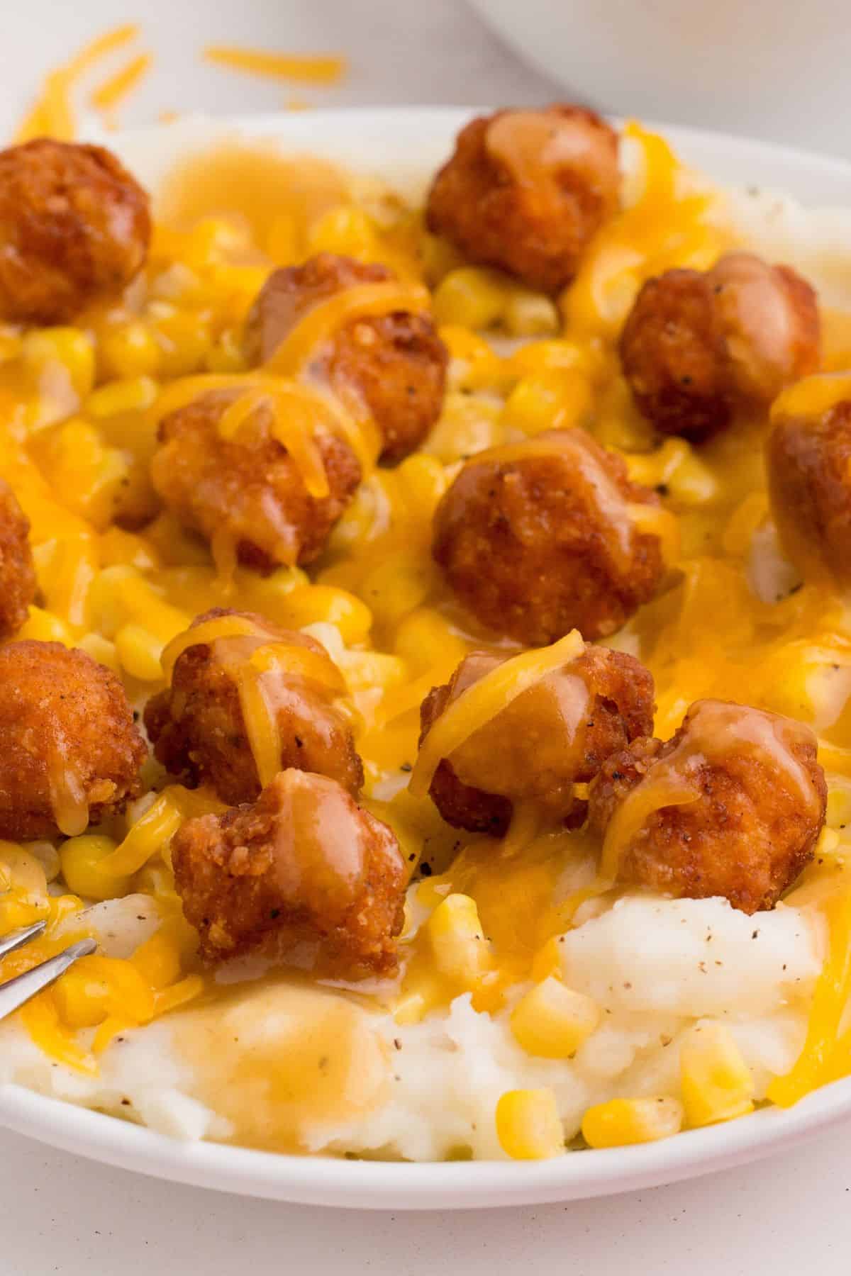 Close up of the KFC bowl recipe to really see the crispy chicken and gravy on the bowl.