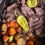 Mississippi pot roast Sunday dinner in a crock pot.
