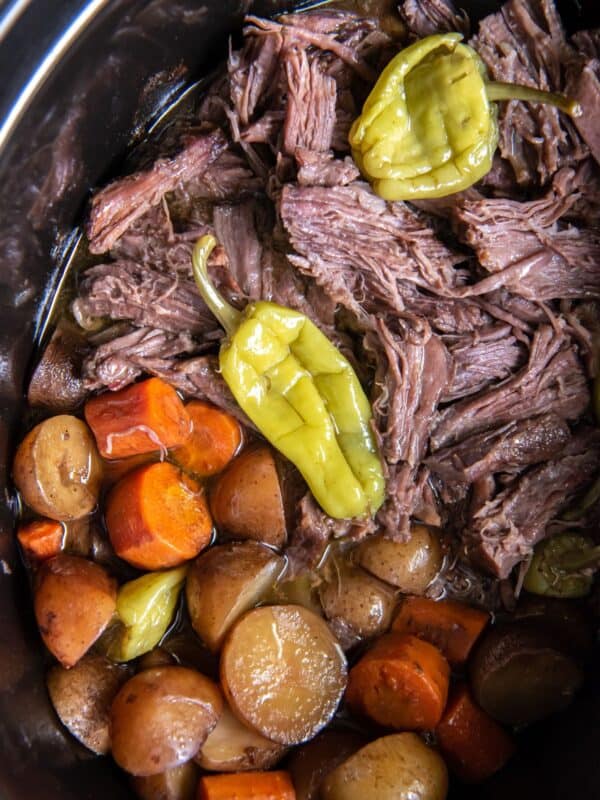 Mississippi pot roast Sunday dinner in a crock pot.